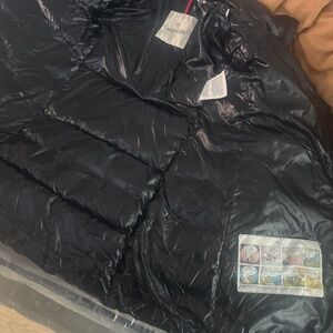 Moncler 4y jacket . That fits till 6y